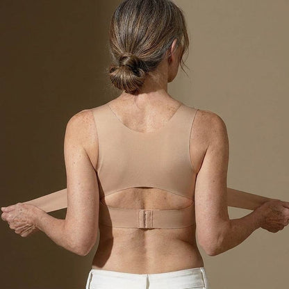 Back view: smooth back panel with two side straps you pull forward and fasten with the hook clasp
